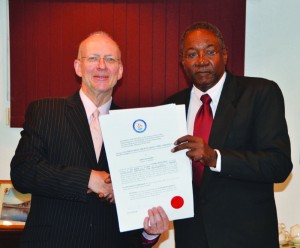 Governor Harrison presenting       Letters Patent to Mr. Benjamin QC