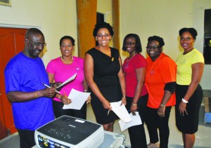 Jeopardy quiz organiser Mrs. Challenger-Gibson (centre) with organising team