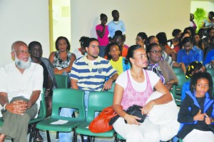 Historian Colville Petty and others observing Jeopardy quiz