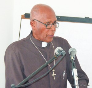 Rev. Menes Hodge conducting meditation service