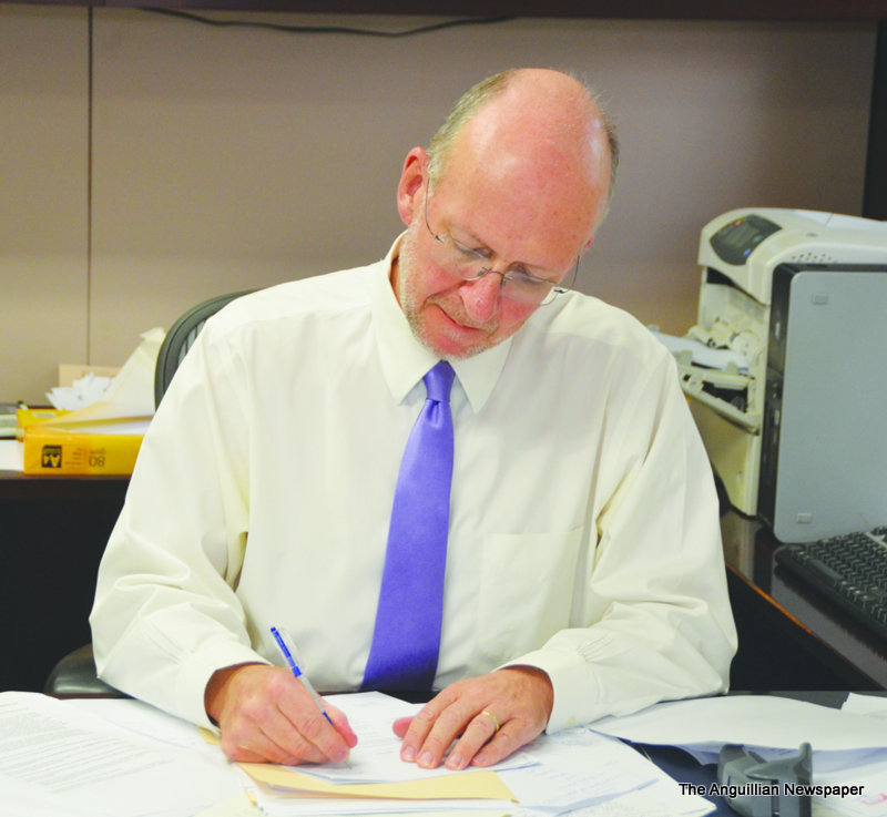 GOVERNOR SIGNS ANGUILLA’S 2013 BUDGET