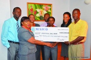 Cheque presentation by Mrs. Joan Hodge to Mr. Vanterpool