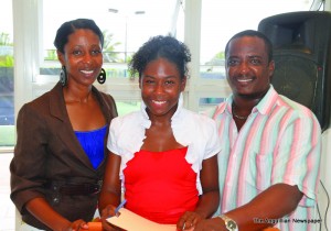 L-R: Ms. Avonella Griffith, Ms. Avern Gumbs and Mr. Mitchelle Lake (after signing contract)