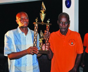 Presentation of trophy to Oscar Richardson (right)