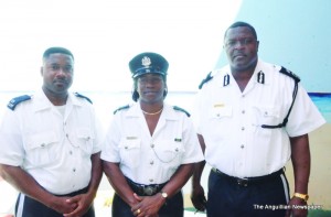 L-R: Dare Officers Shawn Lake and Augustina Carbon with Commissioner Rudolph Proctor