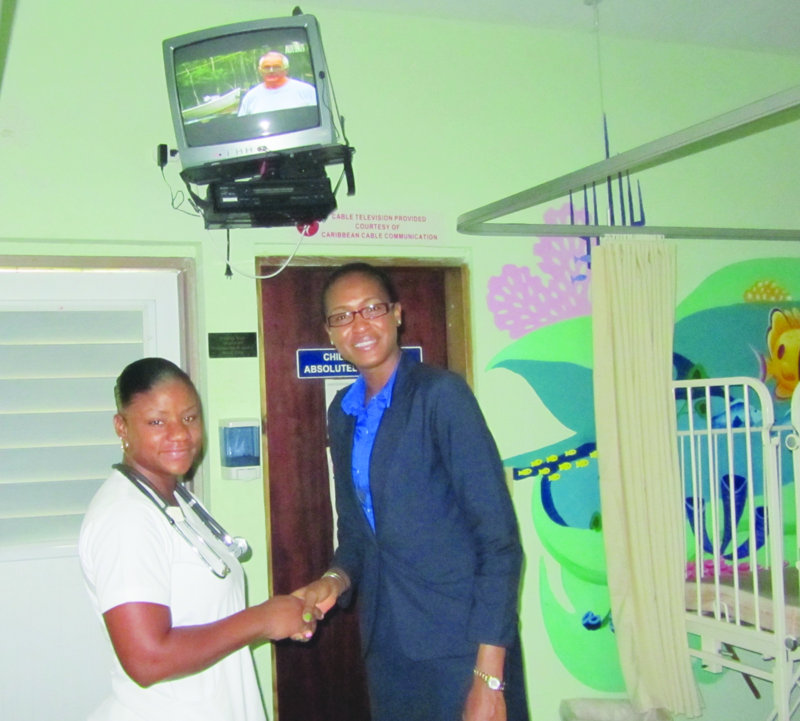 CARIBBEAN CABLE COMMUNICATIONS AND MR. KENNETH HARRIGAN AND MR. OSBOURNE FLEMMING MAKE CABLE TV DONATION TO PRINCESS ALEXANDRA HOSPITAL