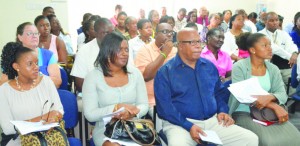 Front row: Mrs. Dawn Reid, Mrs. Chanelle Petty-Barett; Chief Minister Hughes and others at the Consultation