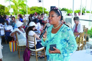 Women being address in Anguilla by Director of Tourism Mrs. Candice Niles