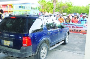 Protesters blocking passage of AG's Vehicle