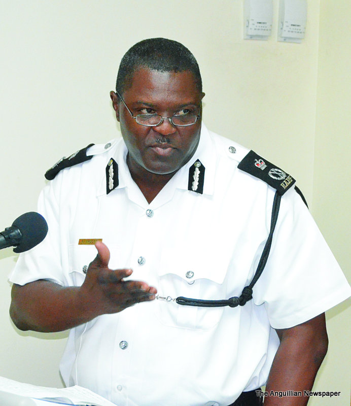 COMMISSIONER ADDRESSES CHAMBER ON CRIME Given Standing Ovation