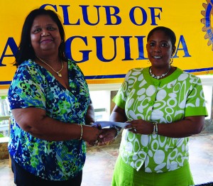 Mrs. Rhonda Connor (left) accepting Cheque