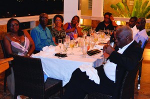 Ms. Veda Harrigan (left) with former Chief Minister Mr. Osbourne Fleming and others