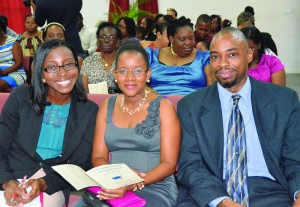 L-R: Shellecia Brooks-Johnson, Mrs. Dawn Reid and Deputy Governor Mr. Stanley Reid and others