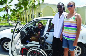 Deion Richardson (inside car) with driving tutor "Tigga", and his mother Daneth Richardson