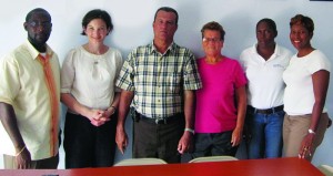 Governor Scott with Hon. Jerome Roberts  and H.O.P.E. Centre Personnel