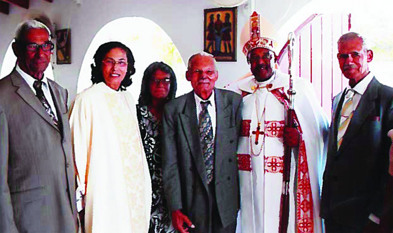 Rev. Amonteen (2nd from left) with brothers and sister, Mr. Ronald Webster and Bishop Ambrose Gumbs