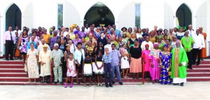 Bishop Errol Brooks with members of Anglican Congregation