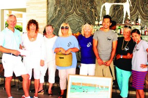 General Manager of Viceroy, Richard Alexander with Jackie Pascher, AARF President, and other AARF volunteers at raffle drawing.