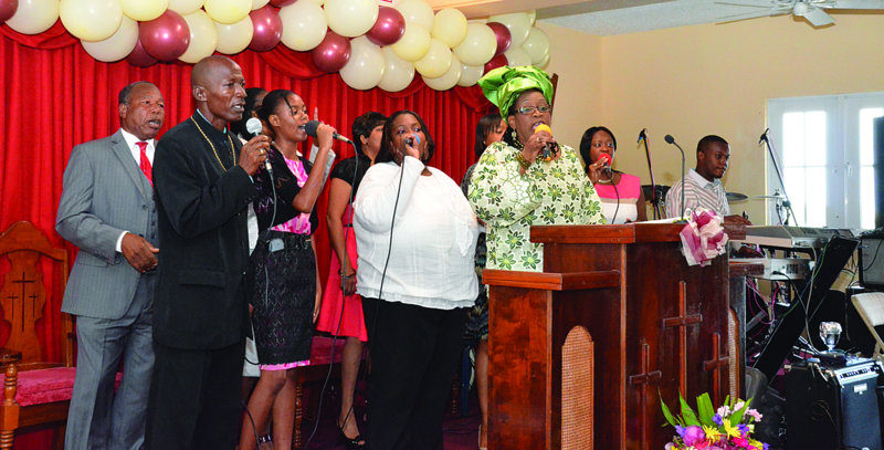 Religion: CHURCH CONGREGATION  OFFERED WORDS OF CHEER