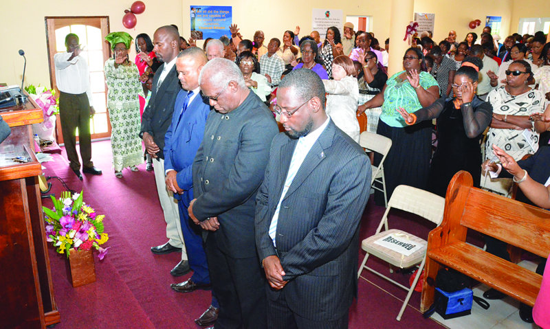 Religion: CHURCH CONGREGATION  OFFERED WORDS OF CHEER
