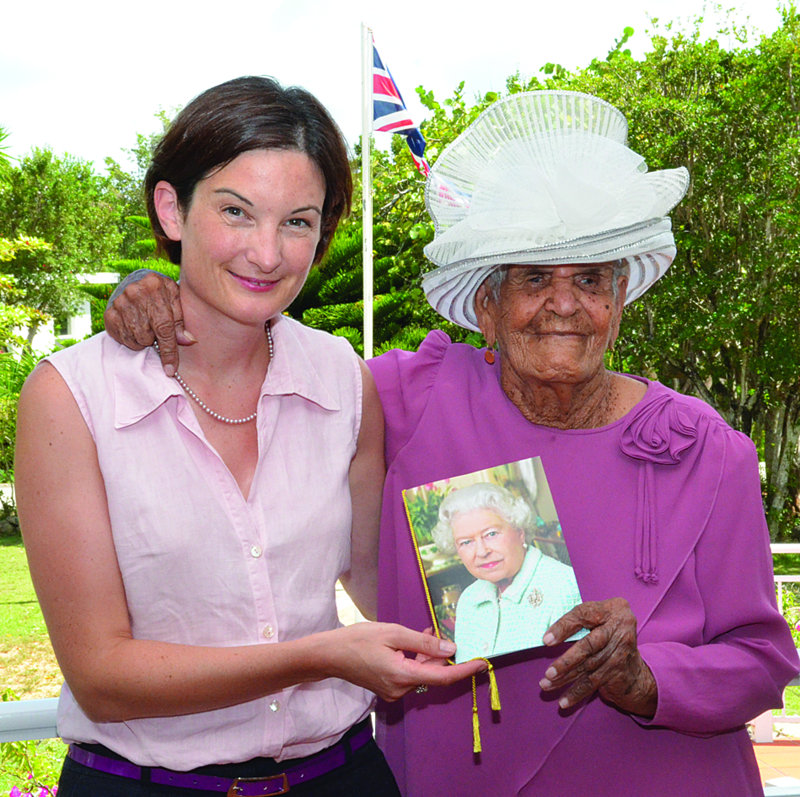 Governor Scott presents Queen's Card to Mrs Ursilla Connor