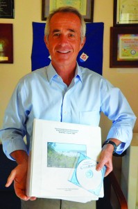 Mr. Tom Graham displaying EIA document