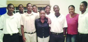 Proud young men who are Job Link-Up clients with DYC Staff, Ms Joylene S. Robin (front middle), Youth Programme Officer and Mrs Hyacinth Augustine Bradley, Senior Programme Officer - Youth Development (on right)