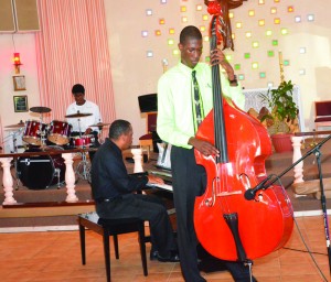 Cordane Richardson on Double Bass with Director Lennox Vanterpool on the Piano