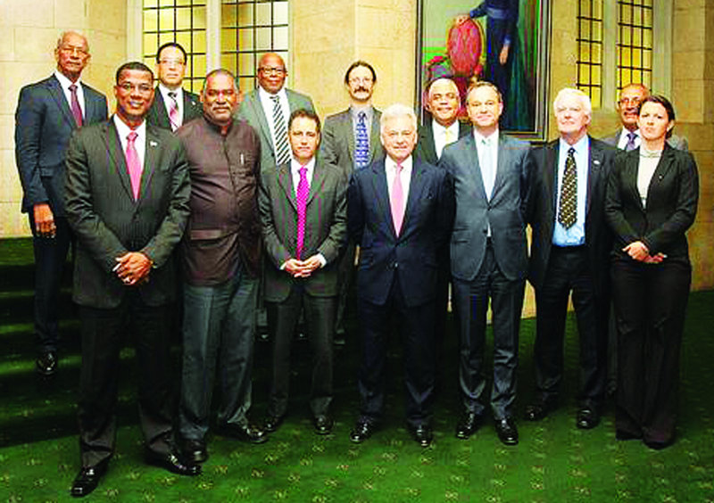 Chief Minister Hughes, UK Minister Mark Simmonds, and other OT Leaders following their formal lunch