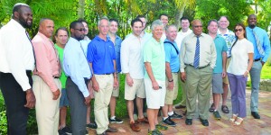 Chief Minister Hughes with Resort's Personnel