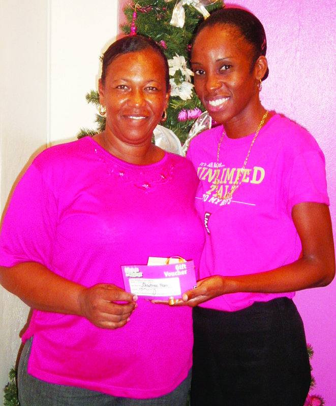 LIME BRINGS ‘Share the Cheer’ TO CUSTOMERS Tina Bannister, Malina Ham, Shonelle Richardson, Jolene Gumbs, Ian Connor, Winston Bryan, Venette Hodge, Carol Morton, Edwin Carty,  Jimmy Richardson, Sonia Skellkie & Alston Gumbs