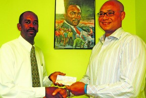 Mr. Tommy Hodge making Donation for Children