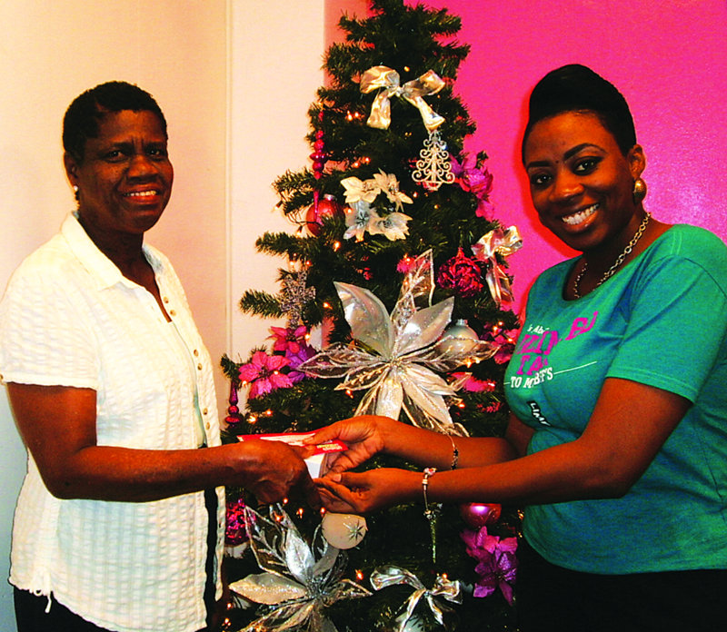 LIME BRINGS ‘Share the Cheer’ TO CUSTOMERS Lenville Connor, Eustella Fontaine,  Bernadine Xavier, Icilma Carty, Maria Foreman, Iona Reid, Leah Richardson, Florita Kentish