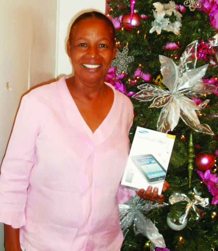 LIME BRINGS ‘Share the Cheer’ TO CUSTOMERS Lenville Connor, Eustella Fontaine,  Bernadine Xavier, Icilma Carty, Maria Foreman, Iona Reid, Leah Richardson, Florita Kentish