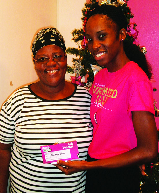 LIME BRINGS ‘Share the Cheer’ TO CUSTOMERS Lenville Connor, Eustella Fontaine,  Bernadine Xavier, Icilma Carty, Maria Foreman, Iona Reid, Leah Richardson, Florita Kentish