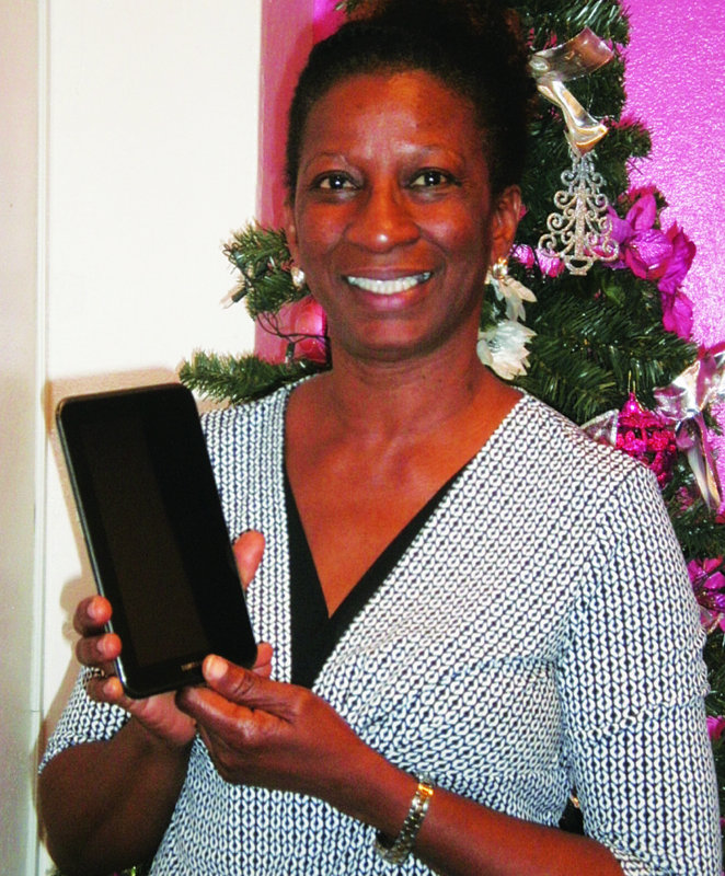 LIME BRINGS ‘Share the Cheer’ TO CUSTOMERS Tina Bannister, Malina Ham, Shonelle Richardson, Jolene Gumbs, Ian Connor, Winston Bryan, Venette Hodge, Carol Morton, Edwin Carty,  Jimmy Richardson, Sonia Skellkie & Alston Gumbs