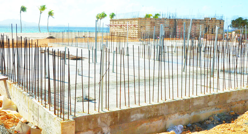 WORK RETURNS TO NORMAL AT REEF HOTEL