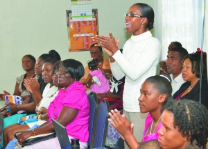 Mrs Vanessa directing Dominion Faith Centre Choir 