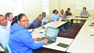 The Executive Meeting with Governor Scott and Deputy Governor Stanley Reid at northern end of the table