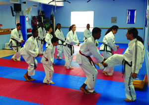 Master Suarez (right) working with some of the seminar participants.