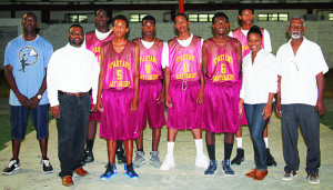 Team’s Coach(Cuthbert Jackson), Members of the Rogers Family in white( Foster Rogers, Shellya Rogers, Hon. Leroy Rogers), A.L.H.C.S’s Spartans Basketball Team.