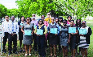 Lonnie Hobson (2nd from left) with certified trained Persons