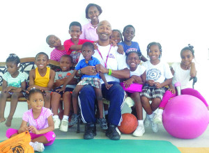 Central Christian School Grade 1 students with Coach Louis (seated) and Tr. Adams (standing) 