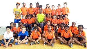 Omololu International School students with Coach Louis Price