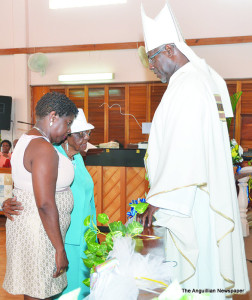 Bishop's blessing on Centenarian and niece