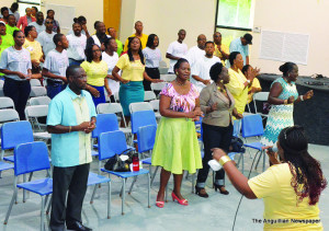 Teachers and The Minister of Education, Mr. Jerome Roberts