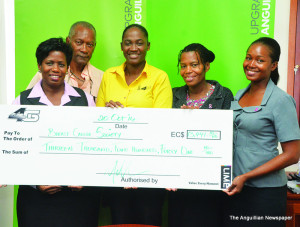 Ms. Jade Reymond presents Cheque to Anguilla Cancer Society