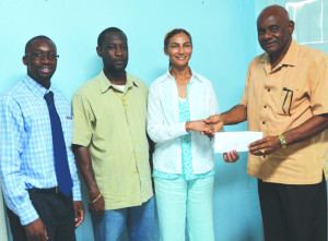 Minister Lester Hodge, Minister Jerome Roberts Mrs Renuka Harrigan and Mr Gifford Connor