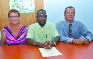 Ms Ami Hunte, Minister Jerome Roberts and Pastor Gareth Hodge