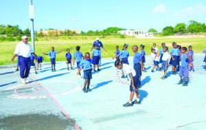 In the above photographs, children from the kindergarten section of the Adrian T Hazell Primary School practice their skipping skills. The activity, supervised by Physical Education Teachers, Frank Claxton and John Martin, was held on Tuesday this week at school's basketball court.